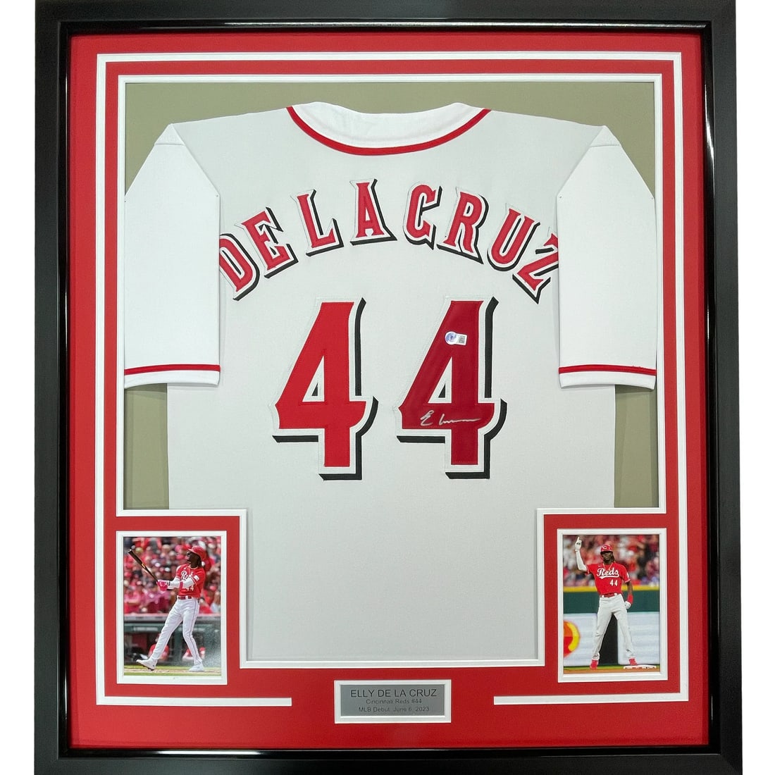 Framed Elly De La Cruz Signed Jersey with BAS COA: Framed Elly De La Cruz Signed Jersey with BAS COA Celebrate your love for baseball with this professionally framed and matted Elly De La Cruz Cincinnati Reds jersey. The jersey is autographed by the r