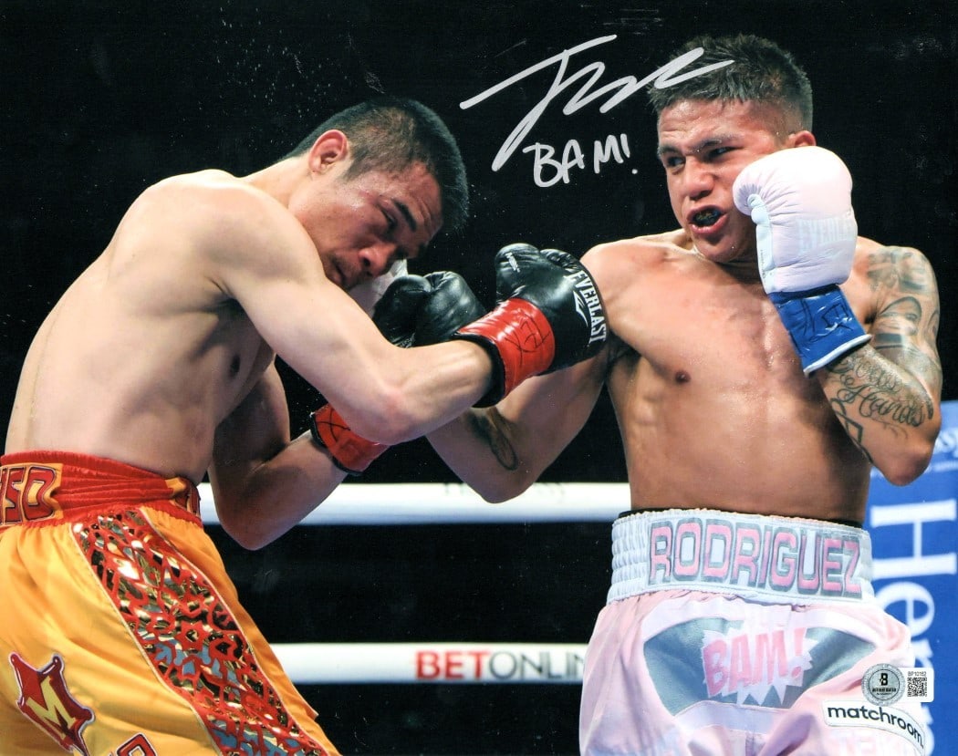 Jesse Rodriguez Autographed 11X14 Boxing Photo Beckett Authenticated: Jesse Rodriguez Autographed 11X14 Boxing Photo Beckett Authenticated Capture the excitement of boxing with this Jesse Rodriguez signed autographed 11X14 photo featuring an action shot. This original p