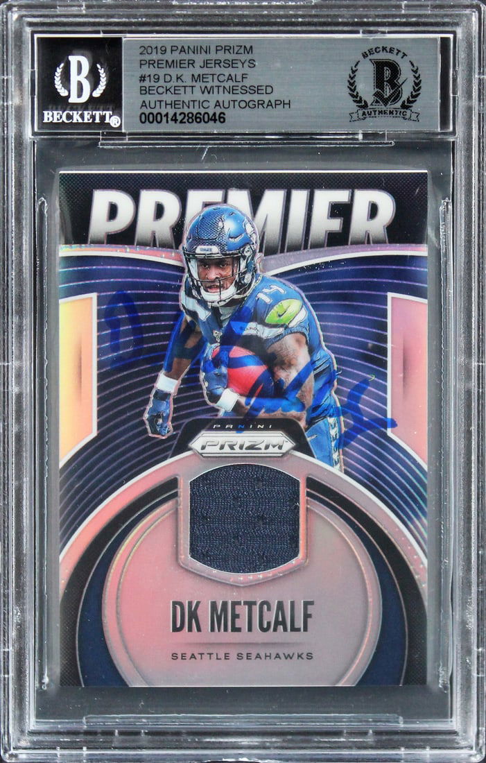 D.K. Metcalf Autographed 2019 Panini Prizm Premier #19 Card Gem Mint 10 Beckett: D.K. Metcalf Autographed 2019 Panini Prizm Premier #19 Card Gem Mint 10 Beckett This 2019 Panini Prizm Premier #19 card features the autograph of D.K. Metcalf, star wide receiver for the Seattle Seaha