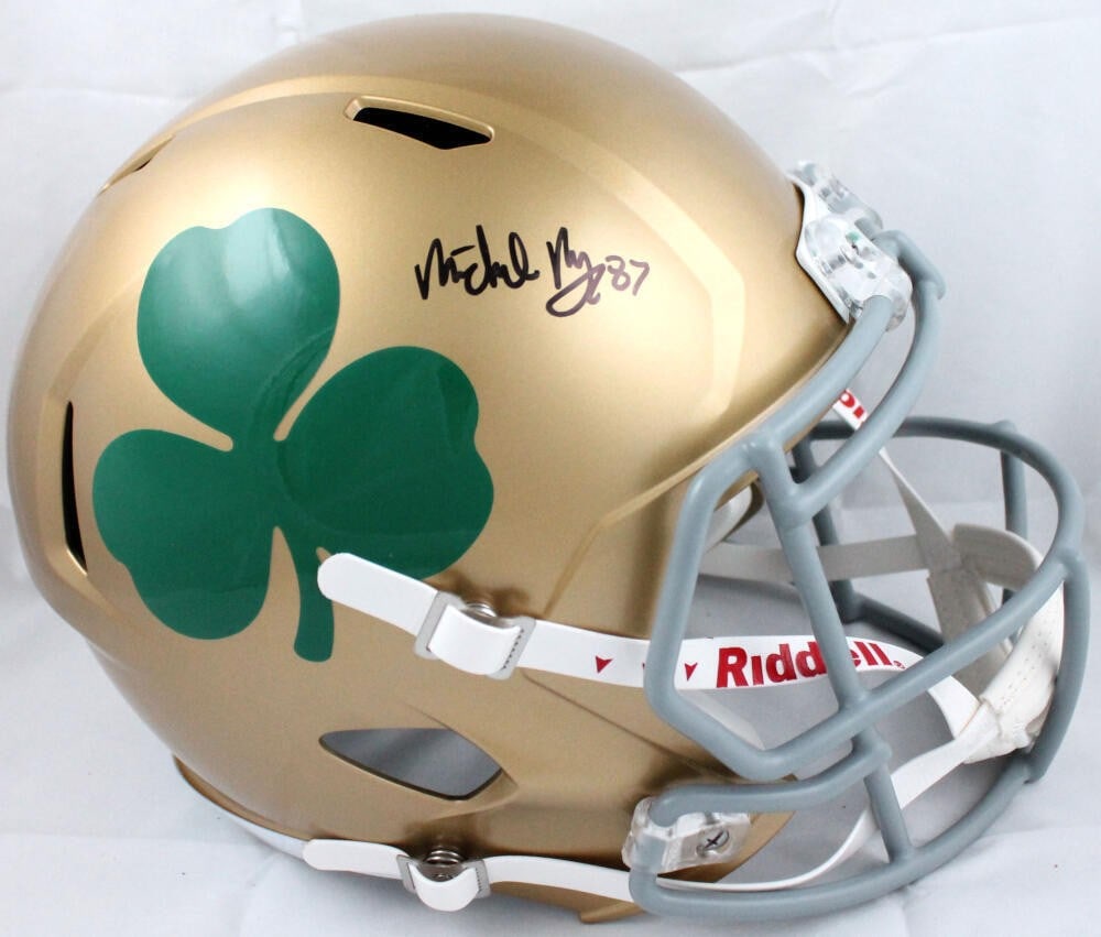 Michael Mayer Signed Notre Dame Full Size Shamrock Helmet Beckett Authenticated: Michael Mayer Signed Notre Dame Full Size Shamrock Helmet Beckett Authenticated This is an authentic Notre Dame full-size Shamrock Speed helmet, signed by player Michael Mayer. The item is certified b