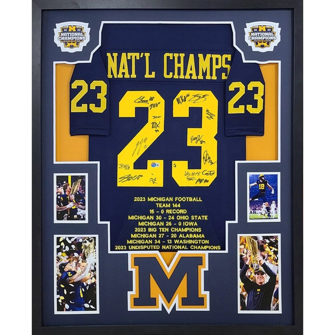 Michigan 2023 Team Signed Framed Jersey Beckett Authenticated 18 Signatures: Michigan 2023 Team Signed Framed Jersey Beckett Authenticated 18 Signatures Celebrate Michigan's 2023 Championship with this autographed framed jersey, featuring signatures from 18 key players includi