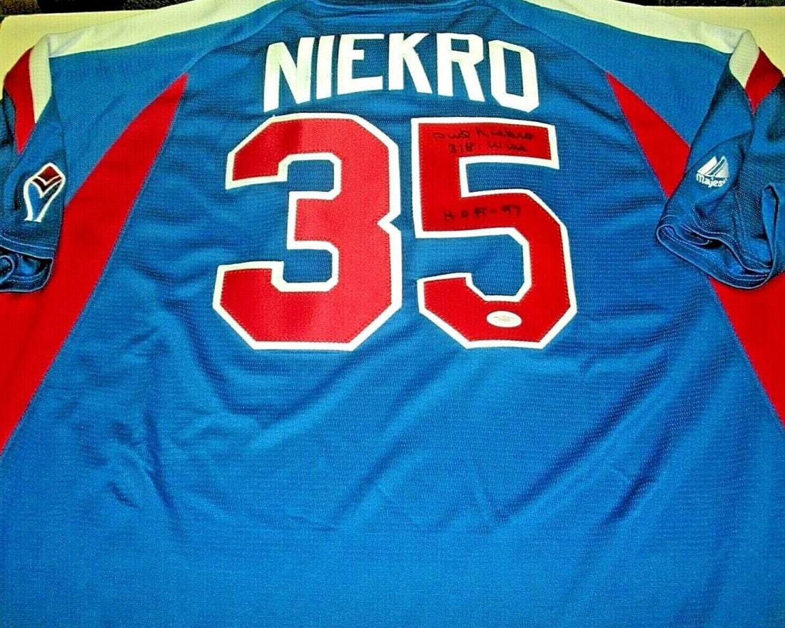 Phil Niekro Signed Atlanta Braves Majestic Jersey with JSA COA: Phil Niekro Signed Atlanta Braves Majestic Jersey with JSA COA This official Majestic jersey is a tribute to Phil Niekro, a legendary player for the Atlanta Braves and a Hall of Famer. The jersey is p
