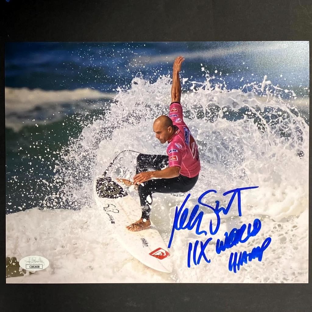 Autographed Kelly Slater 8x10 Surfing Photo JSA Authenticated With Inscription: Autographed Kelly Slater 8x10 Surfing Photo JSA Authenticated With Inscription This is an original 8x10 photograph signed by surfing champion Kelly Slater, featuring the inscription "11x World Champ."