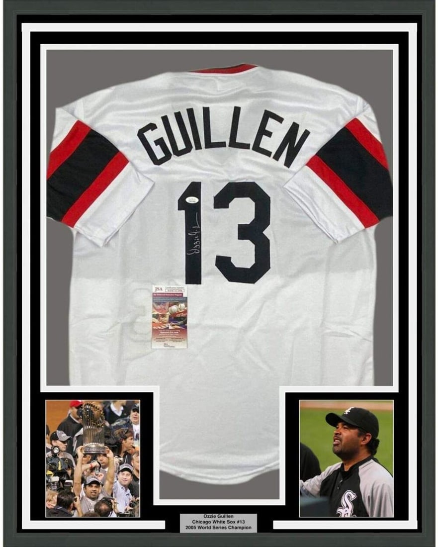 Framed Autographed Ozzie Guillen Jersey Chicago White Sox JSA COA 33x42: Framed Autographed Ozzie Guillen Jersey Chicago White Sox JSA COA 33x42 Celebrate the legacy of Ozzie Guillen with this professionally framed and autographed Chicago White Sox retro white jersey. Meas