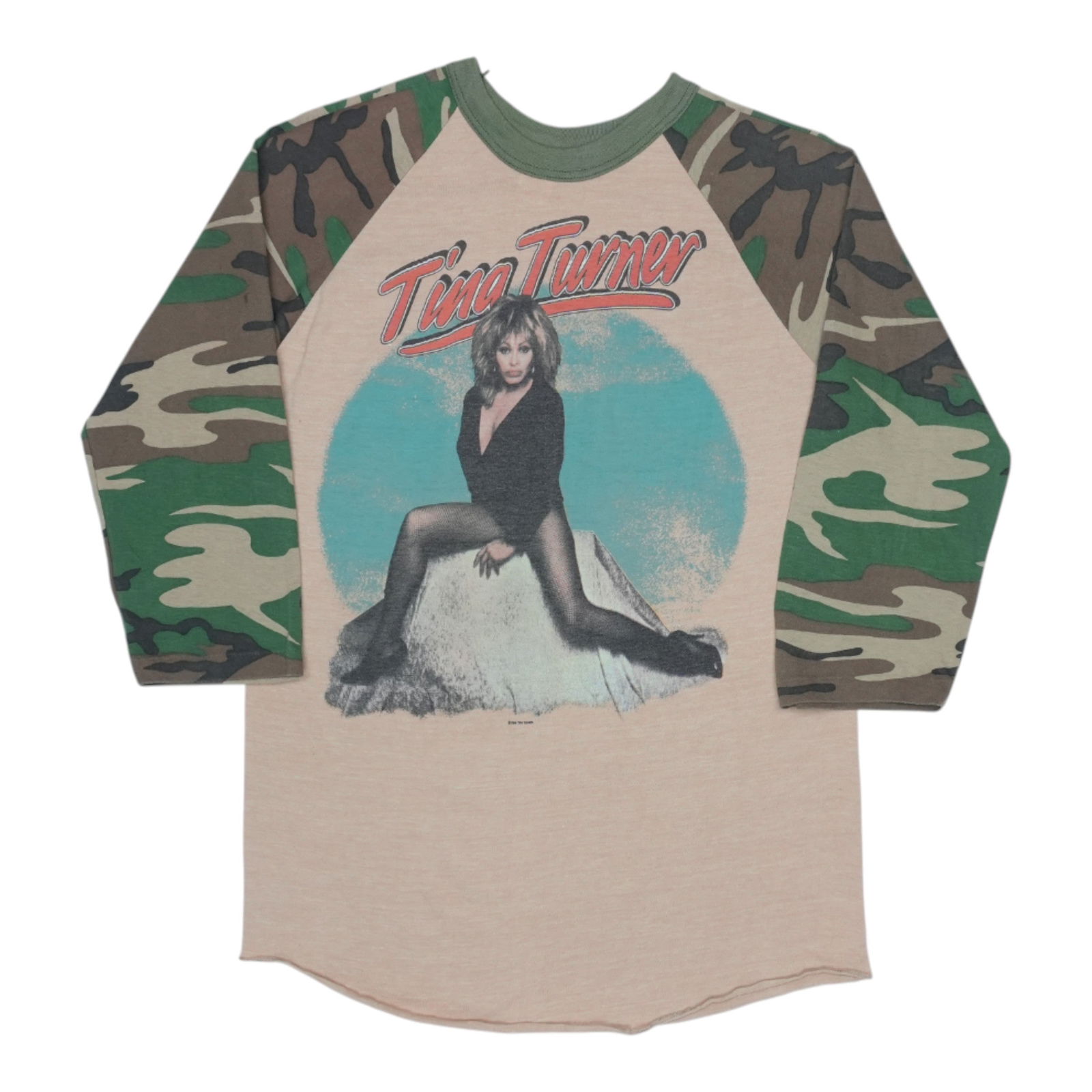 Vintage 1984 Tina Turner Jersey Shirt with Camouflage Sleeves: Vintage 1984 Tina Turner Jersey Shirt with Camouflage Sleeves This is an original vintage 1984 Tina Turner camo sleeve jersey shirt. The shirt features camo-colored sleeves, no back graphics, and is m