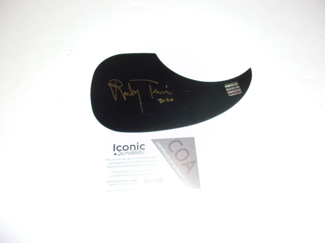 Randy Travis Signed Guitar Pick Guard with COA Country Music Hall of Fame: Randy Travis Signed Guitar Pick Guard with COA Country Music Hall of Fame This is an original signed guitar pick guard by country music legend Randy Travis, a prominent figure in the Country Music Hal