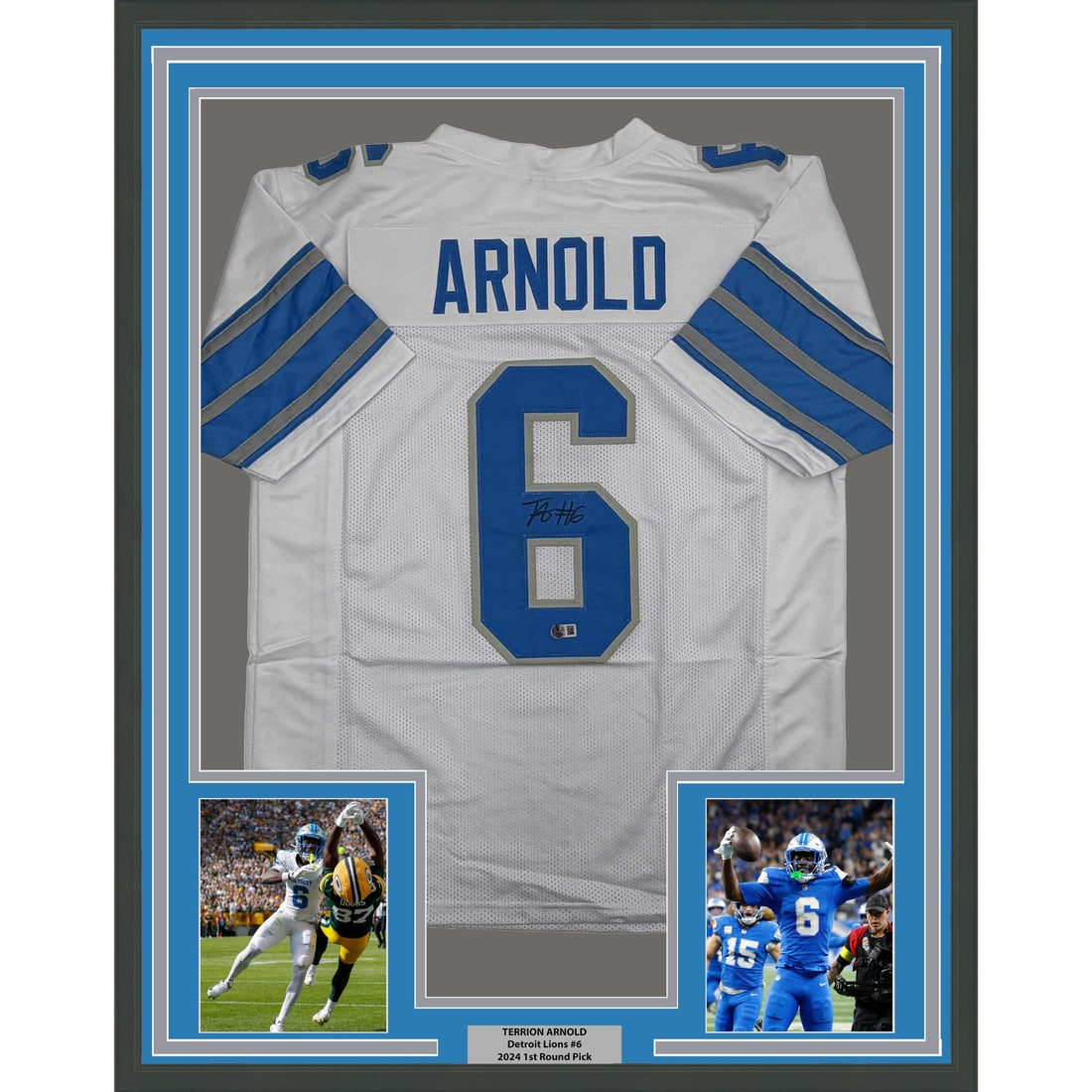 Terrion Arnold Signed Detroit Lions Jersey Display 35x39 Beckett Authenticated: Terrion Arnold Signed Detroit Lions Jersey Display 35x39 Beckett Authenticated This professionally framed and matted display features a Detroit Lions white jersey autographed by Terrion Arnold. The pi