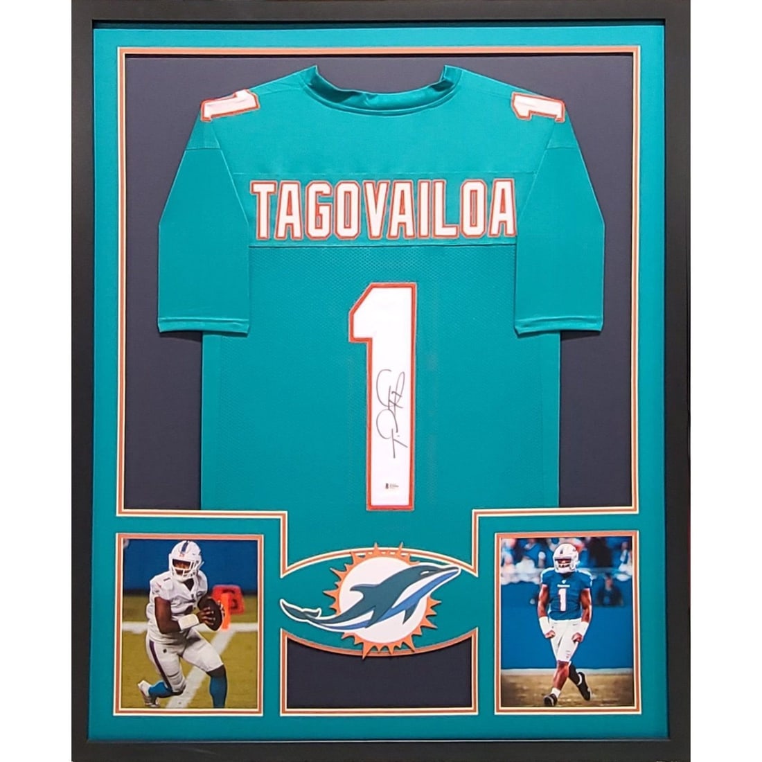 Tua Tagovailoa Autographed Framed Jersey with Beckett Authentication: Tua Tagovailoa Autographed Framed Jersey with Beckett Authentication This is a stunning framed jersey of Tua Tagovailoa, showcasing his signature and authenticated by Beckett, a leader in sports memor