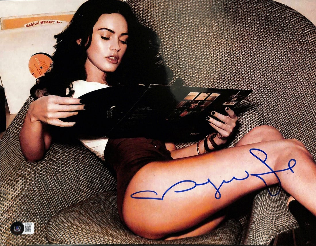Megan Fox Signed 11x14 Photo Beckett Certified: Megan Fox Signed 11x14 Photo Beckett Certified This stunning 11X14 photograph features actress Megan Fox, beautifully signed in blue permanent marker. The piece is an original signed item, authenticat
