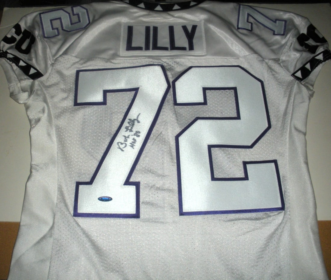 BOB LILLY TCU HORNED FROGS SIGNED OFFICIAL RUSSELL JERSEY with COA: BOB LILLY TCU HORNED FROGS SIGNED OFFICIAL RUSSELL JERSEY with COA This official licensed Russell jersey features the signature of BOB LILLY, a celebrated player associated with the TCU Horned Frogs.