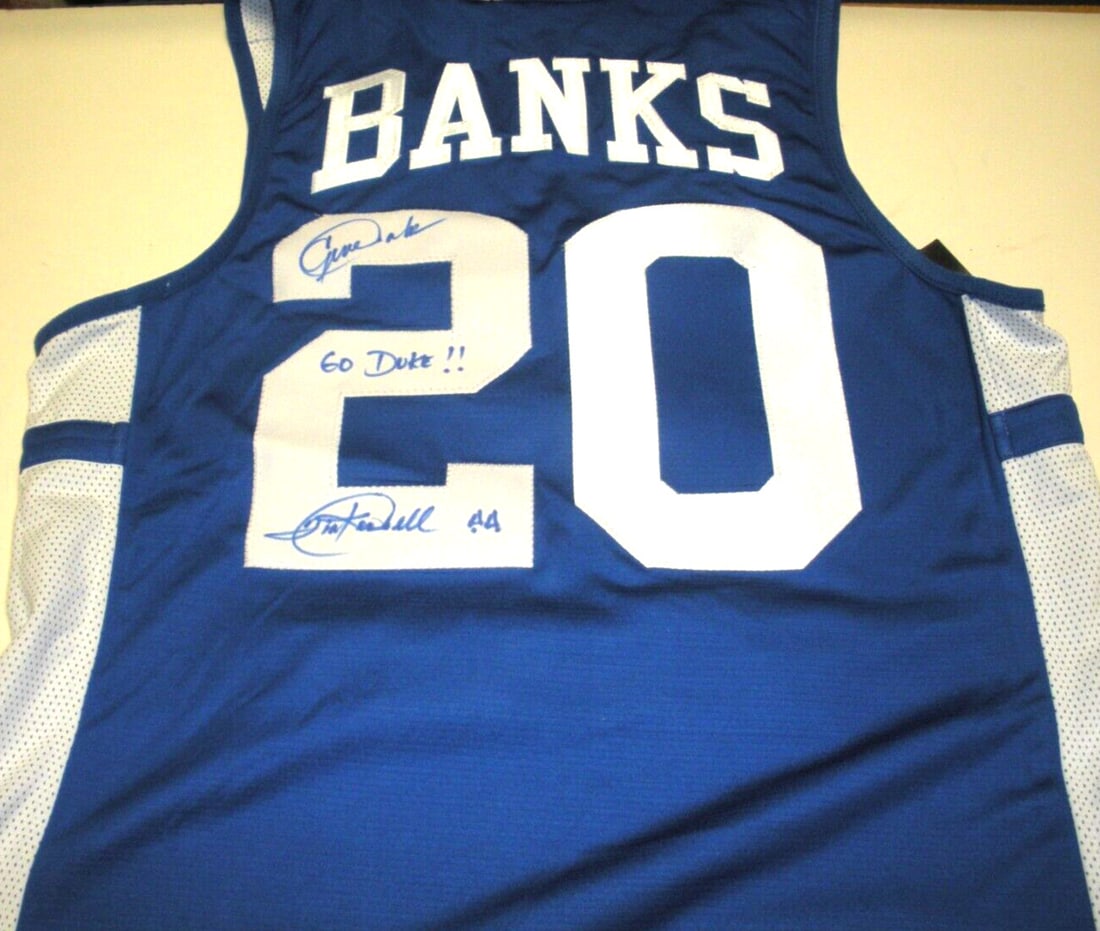 Gene Banks Signed Nike Duke Blue Devils Jersey with COA: Gene Banks Signed Nike Duke Blue Devils Jersey with COA This is an officially licensed Nike jersey featuring Gene Banks, a prominent player for the Duke Blue Devils basketball team. It is a pre-owned