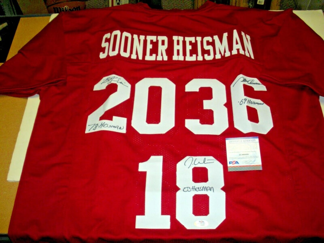 Oklahoma Sooners Signed Jersey by Owens White Sims PSA/DNA: Oklahoma Sooners Signed Jersey by Owens White Sims PSA/DNA This original Oklahoma Sooners jersey is signed by three notable players: Steve Owens, Jason White, and Billy Sims. It is a pre-owned item, m