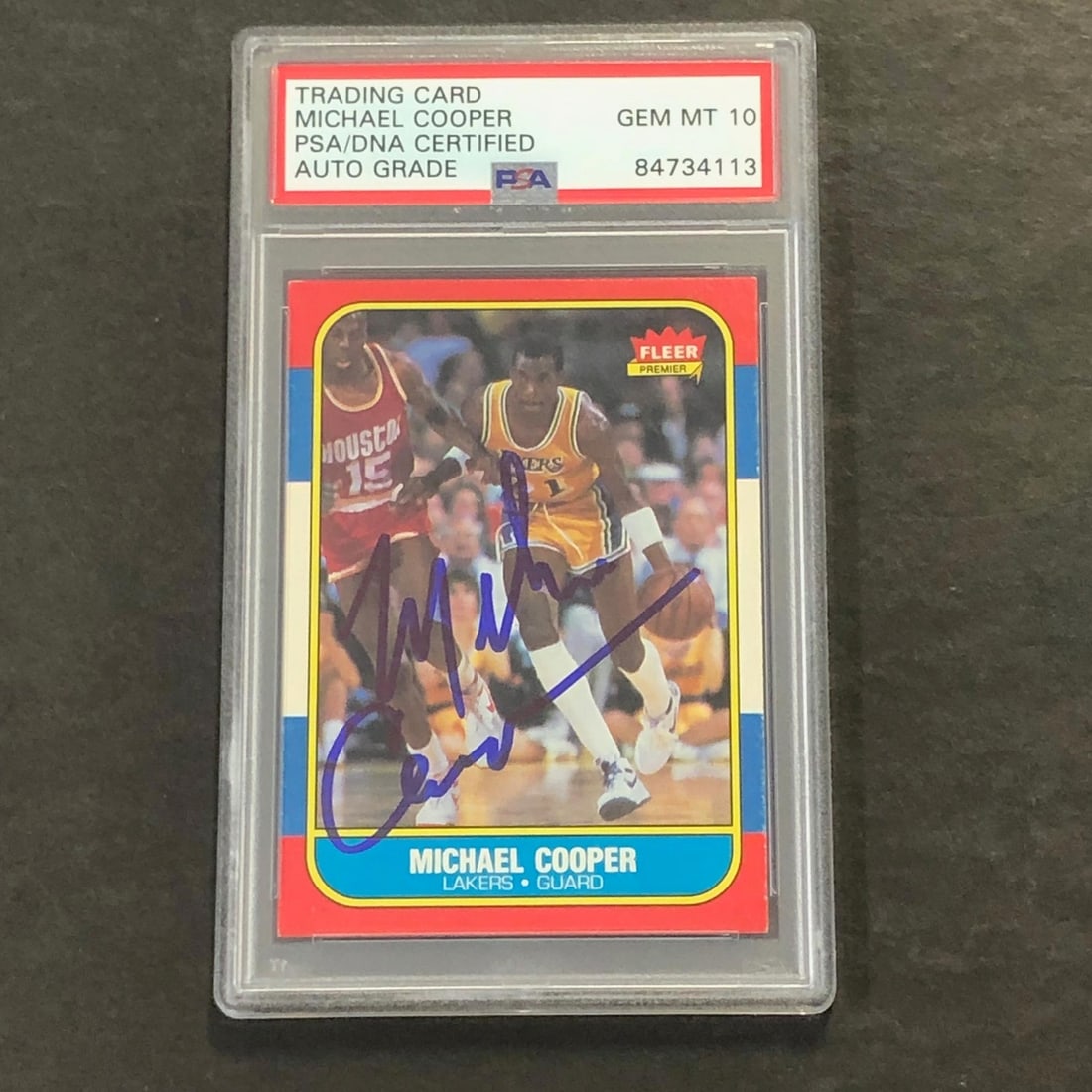 1986 Fleer #17 Michael Cooper Autographed Card PSA Authenticated Lakers: 1986 Fleer #17 Michael Cooper Autographed Card PSA Authenticated Lakers This is a 1986 Fleer #17 basketball card signed by Michael Cooper, a prominent player for the Los Angeles Lakers. The autograph