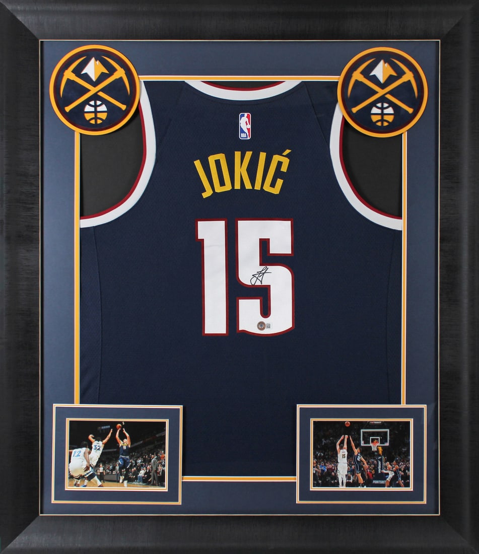 Nikola Jokic Signed Navy Blue Nike Swingman Framed Jersey BAS: Nikola Jokic Signed Navy Blue Nike Swingman Framed Jersey BAS This authentic navy blue Nike Swingman jersey features the signature of Nikola Jokic, star player of the Denver Nuggets. The jersey is pro