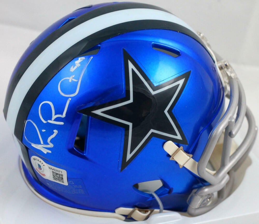 Michael Irvin Autographed Dallas Cowboys Mini Helmet Beckett Authenticated: Michael Irvin Autographed Dallas Cowboys Mini Helmet Beckett Authenticated This is an original mini helmet featuring the iconic Dallas Cowboys design, autographed by legendary player Michael Irvin. Th