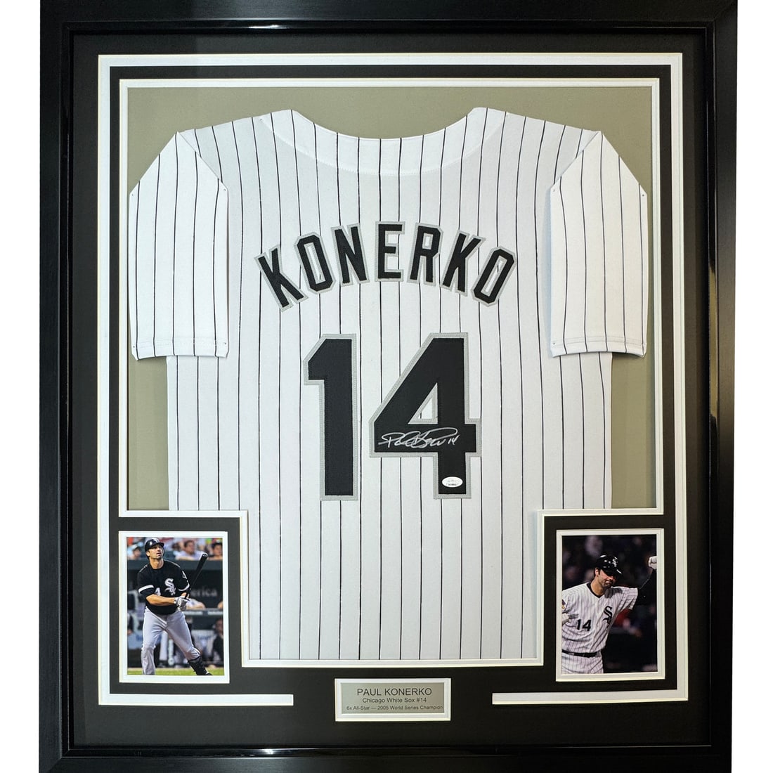 Framed Autographed Paul Konerko Chicago White Sox Jersey with JSA COA: Framed Autographed Paul Konerko Chicago White Sox Jersey with JSA COA Celebrate Chicago White Sox legend Paul Konerko with this professionally framed and autographed 35x39 inch pinstripe jersey. This