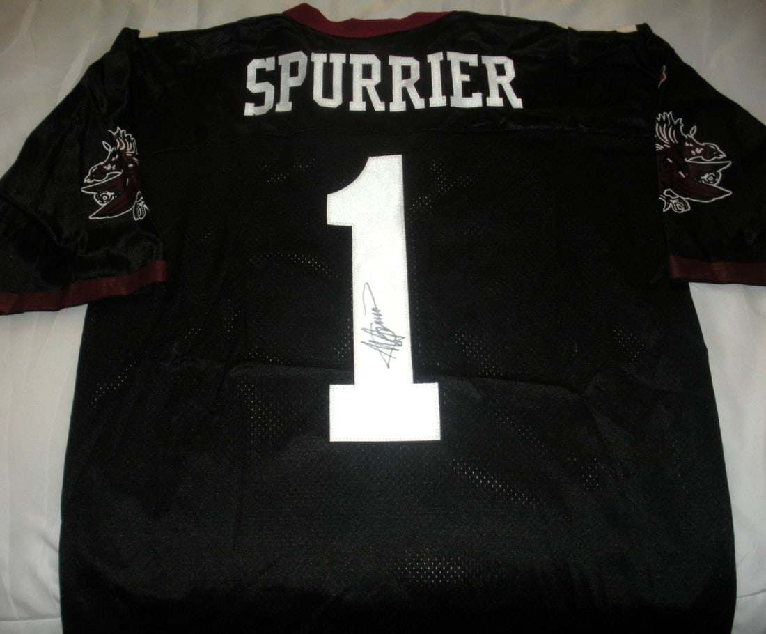Signed Russell Jersey South Carolina Steve Spurrier With COA: Signed Russell Jersey South Carolina Steve Spurrier With COA This is a pre-owned, officially licensed Russell jersey signed by Steve Spurrier, featuring South Carolina Gamecocks branding. The autograp