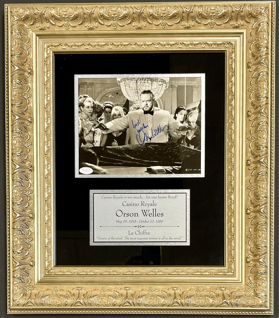 Orson Welles Signed 8x10 Photo Le Chiffre Casino Royale JSA Framed Display: Orson Welles Signed 8x10 Photo Le Chiffre Casino Royale JSA Framed Display This stunning custom framed display features an 8x10 photograph signed by the legendary actor Orson Welles, portraying Le Chi