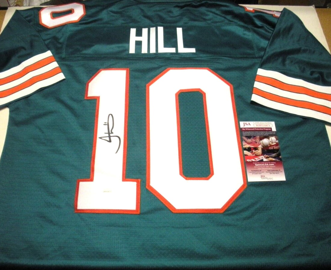 Tyreek Hill Signed Miami Dolphins Proline Jersey with JSA COA: Tyreek Hill Signed Miami Dolphins Proline Jersey with JSA COA This official licensed ProLine jersey features a stunning signature from Tyreek Hill, the renowned Miami Dolphins player. It is an origina