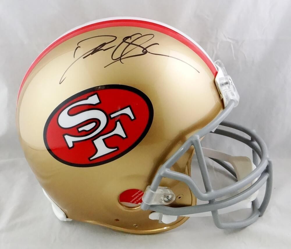 Deion Sanders Signed San Francisco 49ers Authentic Helmet Beckett Authentication: Deion Sanders Signed San Francisco 49ers Authentic Helmet Beckett Authentication This authentic full-size helmet features the signature of football legend Deion Sanders, a prominent player for the San