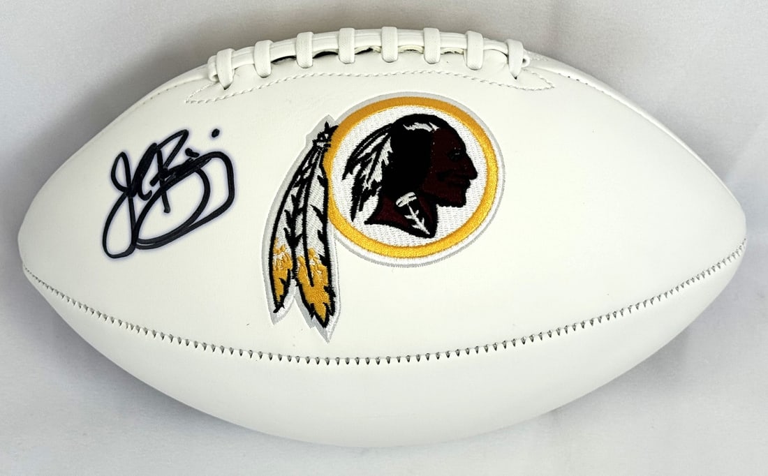 John Riggins Signed Washington Football with Beckett Authentication: John Riggins Signed Washington Football with Beckett Authentication This is an original Washington logo football autographed by legendary player John Riggins. The football features Riggins' signature,