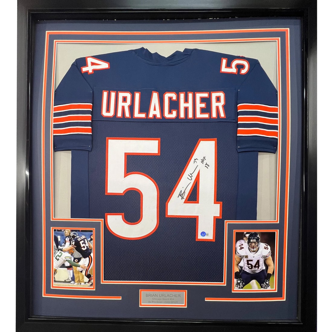 Framed Brian Urlacher Autographed Chicago Bears Jersey with BAS COA: Framed Brian Urlacher Autographed Chicago Bears Jersey with BAS COA Celebrate the legacy of Brian Urlacher with this professionally framed and autographed Chicago Bears jersey. This original blue jers