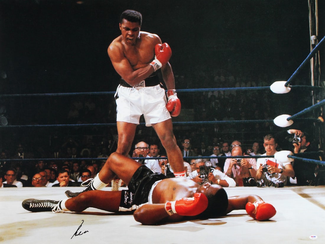 Muhammad Ali Autographed 30x40 Photo vs Sonny Liston PSA/DNA Gem Mint 10: Muhammad Ali Autographed 30x40 Photo vs Sonny Liston PSA/DNA Gem Mint 10 This striking 30x40 photograph captures the iconic moment of Muhammad Ali versus Sonny Liston, personally signed by the legenda