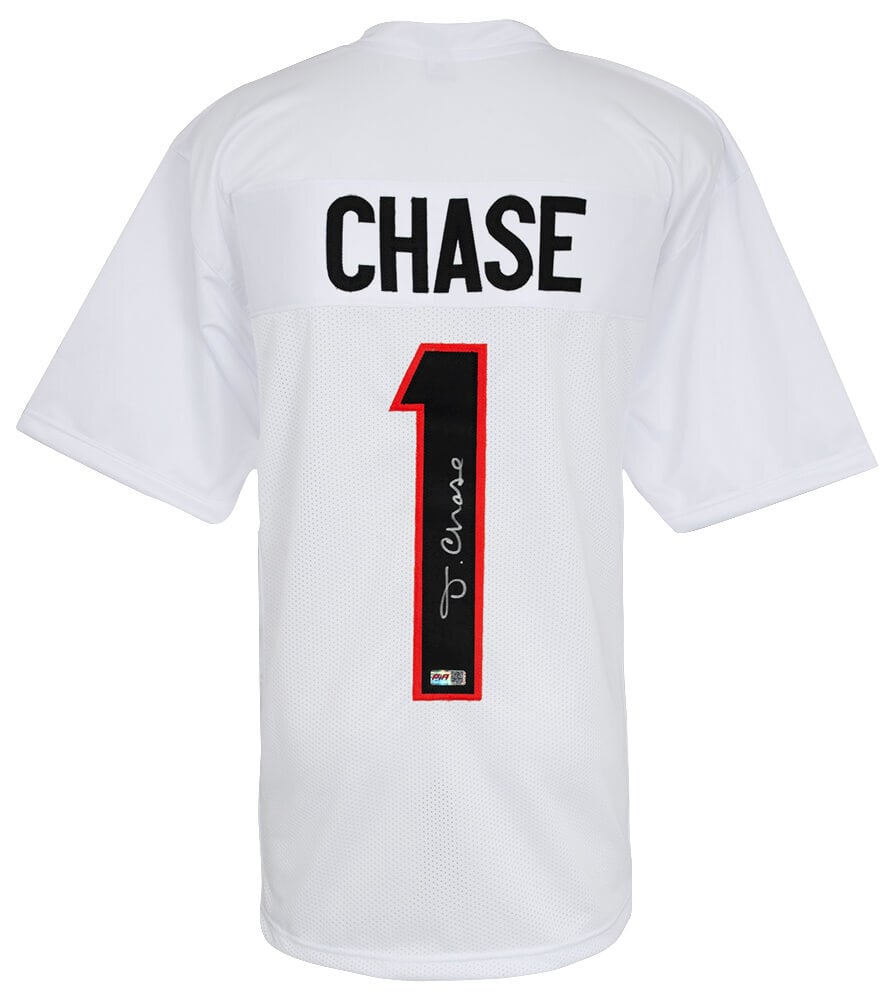 Ja'Marr Chase Signed White Custom NFL Jersey with COA: Ja'Marr Chase Signed White Custom NFL Jersey with COA Ja'Marr Chase Signed White Custom NFL Jersey with COA This is a signed white custom football jersey of Ja'Marr Chase, a standout player for the Ci