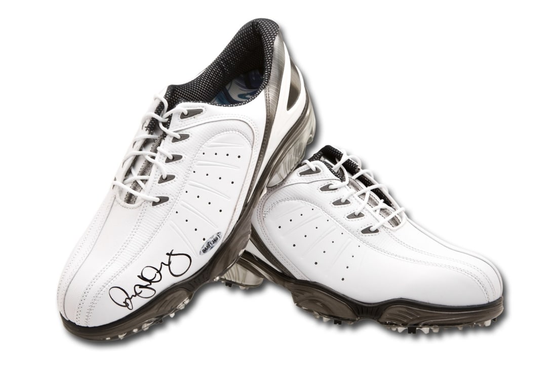 Rory McIlroy Autographed White FootJoy Golf Shoes Upper Deck Certified: Rory McIlroy Autographed White FootJoy Golf Shoes Upper Deck Certified Rory McIlroy autographed golf shoes, a must-have for any golf enthusiast or collector. These white Foot Joy shoes feature the sig