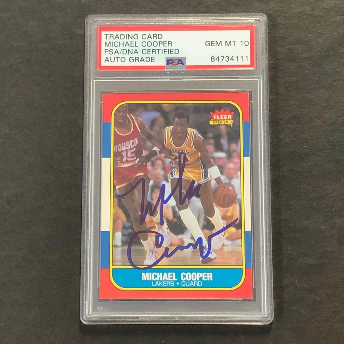 1986 Fleer #17 Michael Cooper Signed Card PSA Authenticated Lakers: 1986 Fleer #17 Michael Cooper Signed Card PSA Authenticated Lakers This listing features a 1986 Fleer #17 card personally signed by Michael Cooper, a former player for the Los Angeles Lakers. The auto