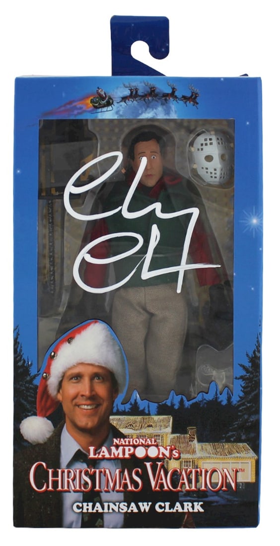Chevy Chase Signed NECA Chainsaw Clark Figure National Lampoon Christmas Vacation BAS Authenticated: Chevy Chase Signed NECA Chainsaw Clark Figure National Lampoon Christmas Vacation BAS Authenticated This NECA Chainsaw Clark Figure, inspired by National Lampoon's Christmas Vacation, features a white