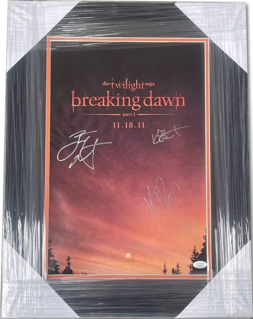 The Twilight Saga Breaking Dawn Cast Signed Poster Framed JSA Authenticated 17x22: The Twilight Saga Breaking Dawn Cast Signed Poster Framed JSA Authenticated 17x22 This original poster features autographs from the cast of 'The Twilight Saga: Breaking Dawn,' including Kristen Stewar