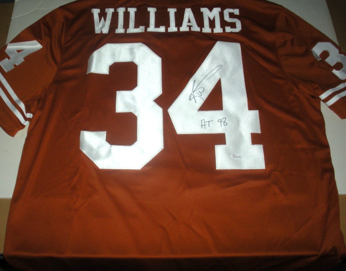 Ricky Williams Texas Longhorns Signed Nike Jersey with JSA COA: Ricky Williams Texas Longhorns Signed Nike Jersey with JSA COA Show your support for the Texas Longhorns with this officially licensed Nike jersey signed by Ricky Williams. This original jersey is a m