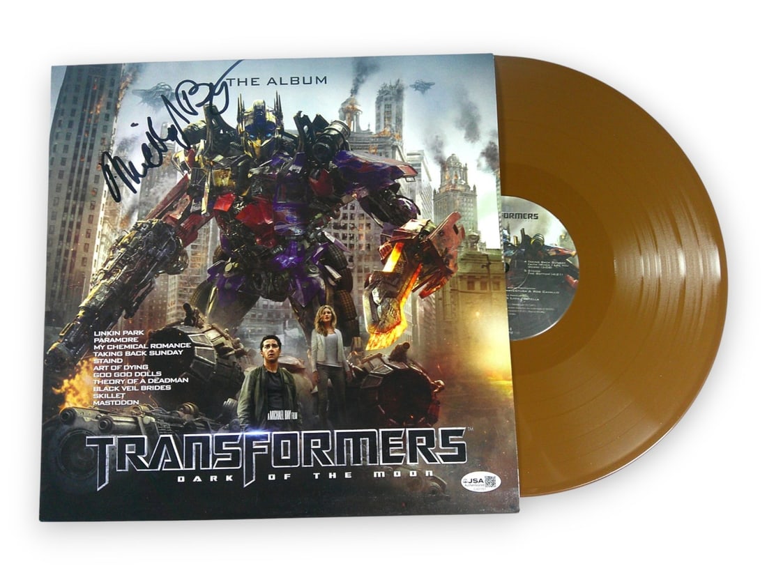 Transformers Album Cover with Michael Bay Signature JSA Authenticated: Transformers Album Cover with Michael Bay Signature JSA Authenticated This is a pre-owned record album cover signed by Michael Bay, known for his work on Transformers. The autograph has been authentic