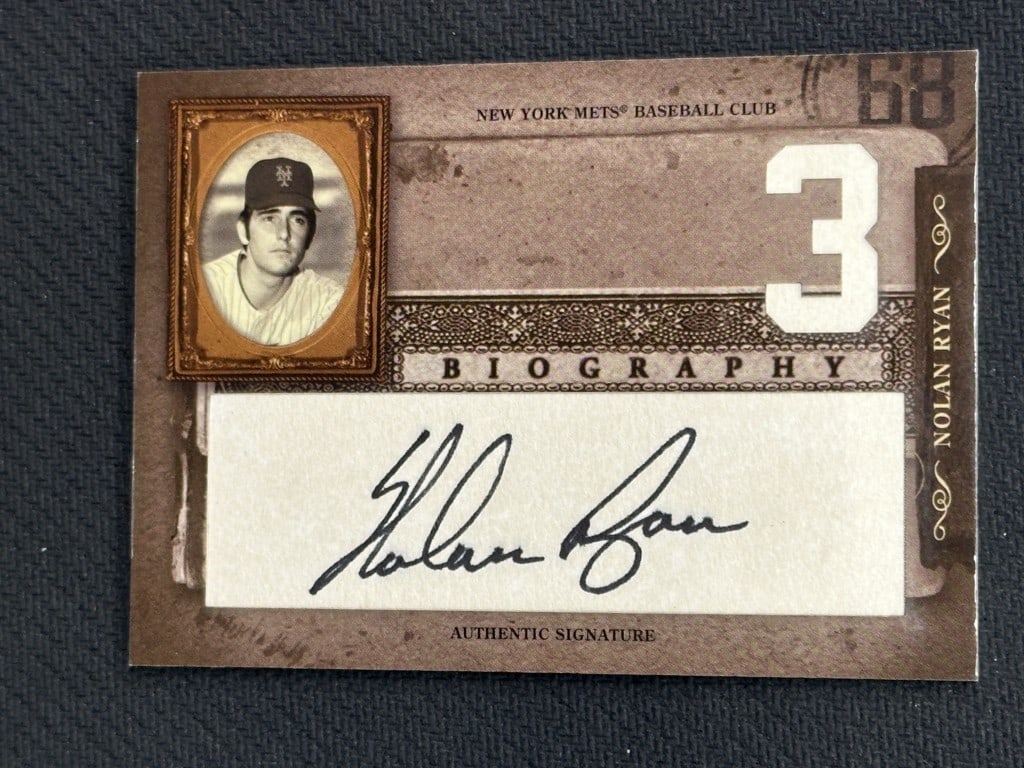 Nolan Ryan 2005 Donruss Biography Relic Auto Baseball Card Mets HOF: Nolan Ryan 2005 Donruss Biography Relic Auto Baseball Card Mets HOF This 2005 Donruss Biography Relic Auto baseball card features the legendary Nolan Ryan, a Hall of Famer known for his incredible pit