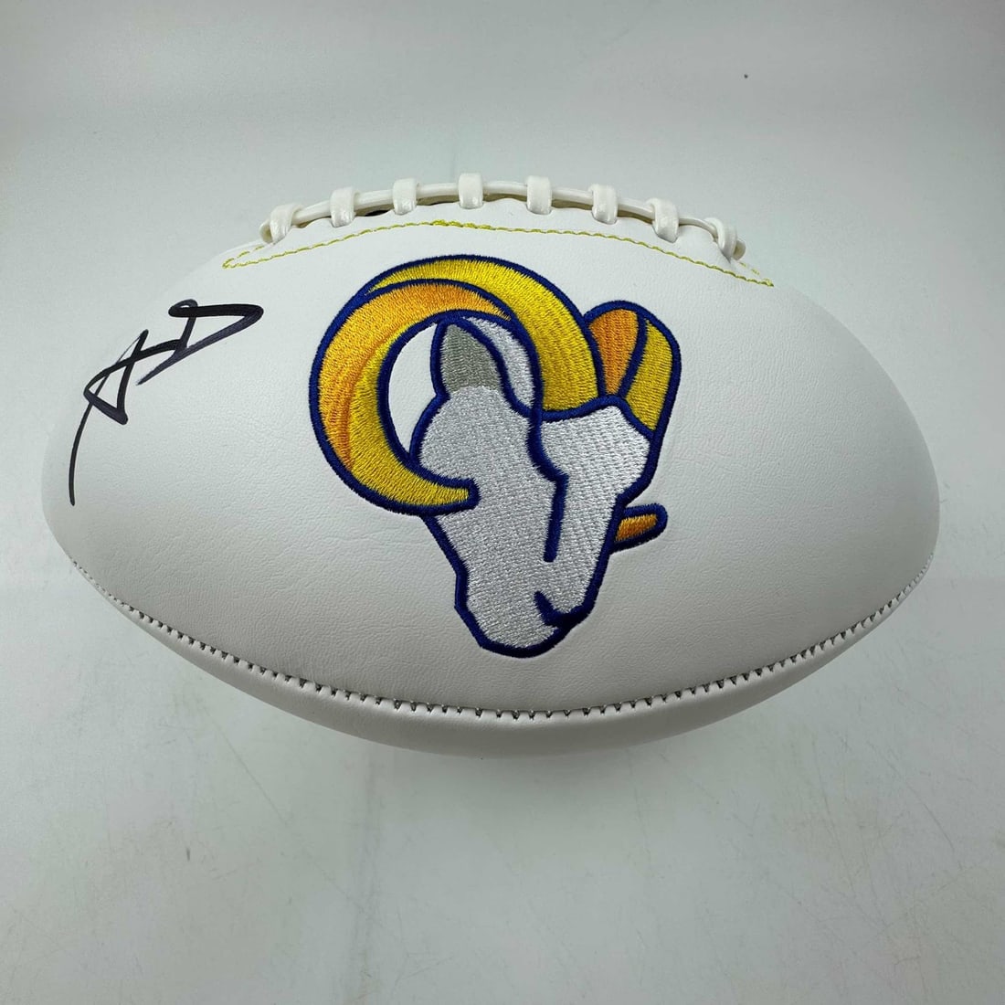 Aaron Donald Signed Rams Full Size Football with BAS COA: Aaron Donald Signed Rams Full Size Football with BAS COA This is an authentic autographed full-size white panel logo football signed by NFL star Aaron Donald, a member of the Los Angeles Rams. The sig
