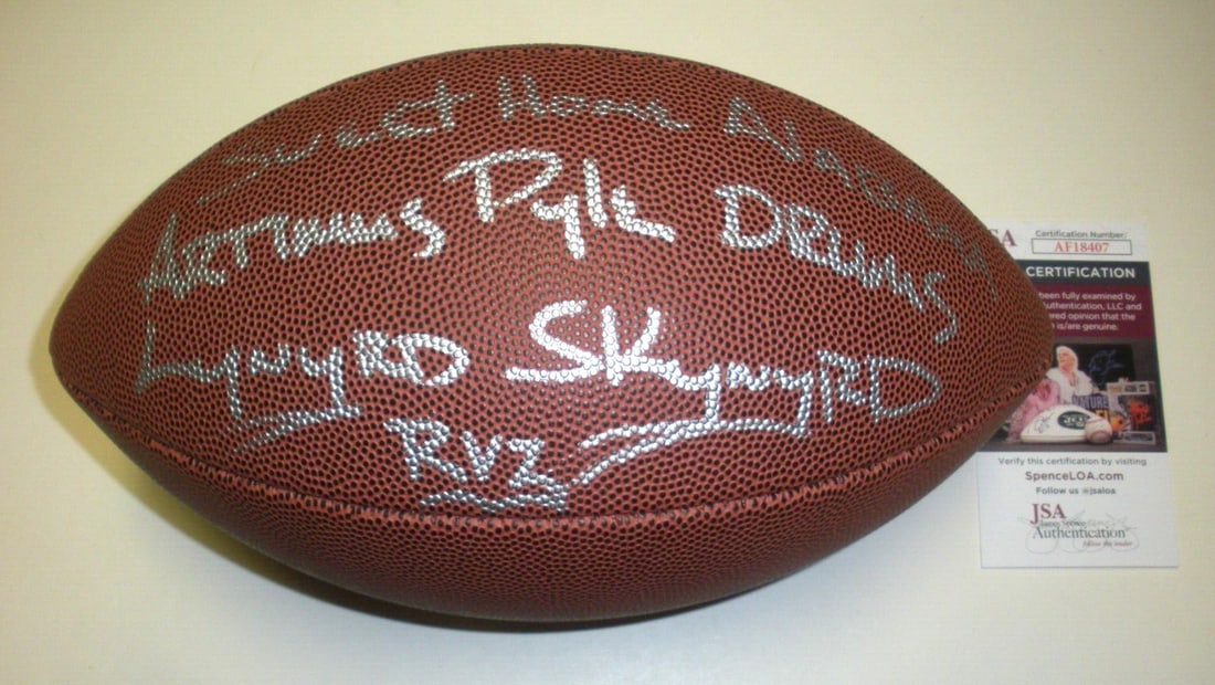Artimus Pyle Lynyrd Skynyrd Signed NFL Football JSA COA: Artimus Pyle Lynyrd Skynyrd Signed NFL Football JSA COA This is an original signed football helmet by Artimus Pyle of Lynyrd Skynyrd, featuring the iconic song "Sweet Home Alabama." The helmet comes w