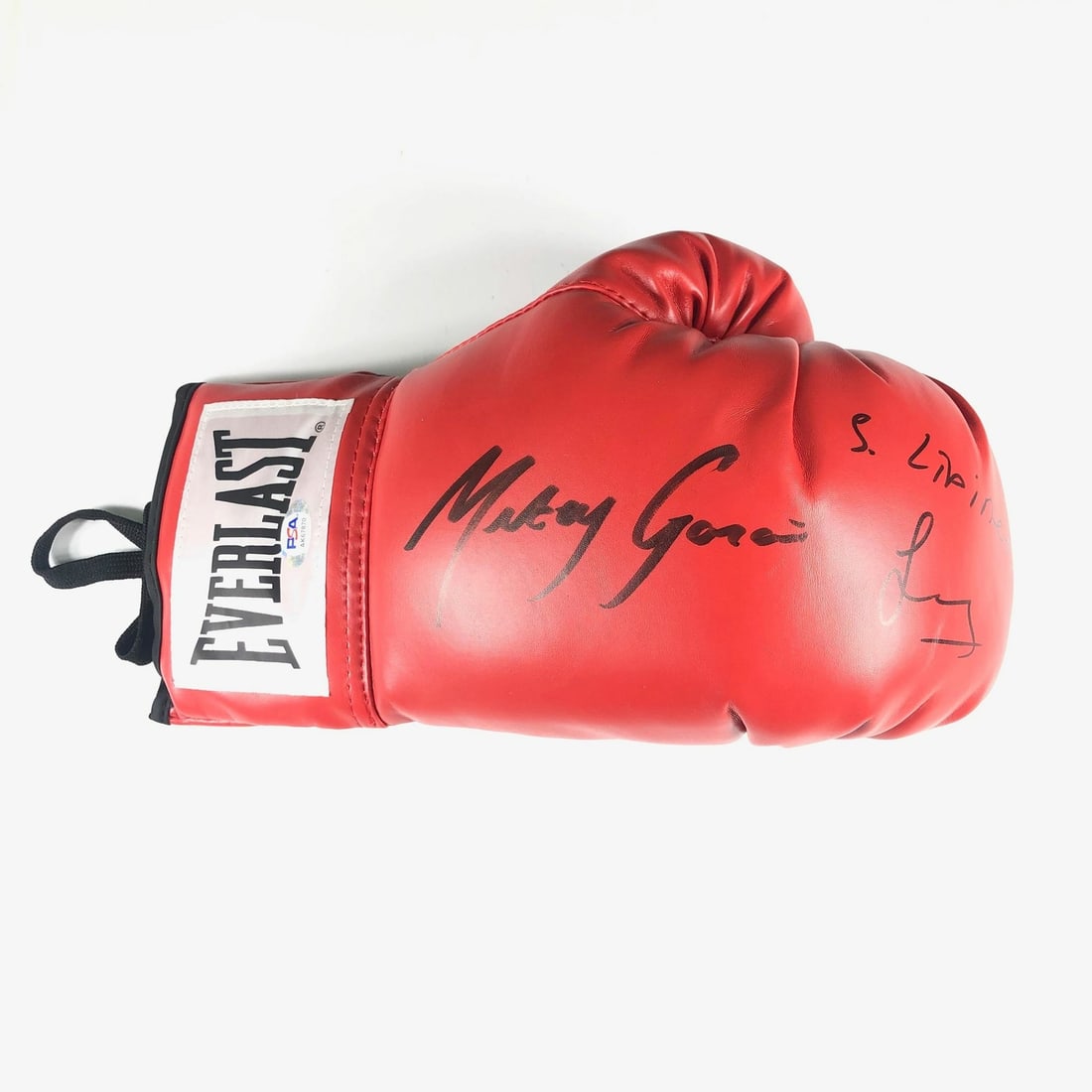 Mikey Garcia Autographed Boxing Glove PSA/DNA Certified: Mikey Garcia Autographed Boxing Glove PSA/DNA Certified This boxing glove is an authentic piece of memorabilia signed by the legendary Mikey Garcia, a former world champion across four weight classes.