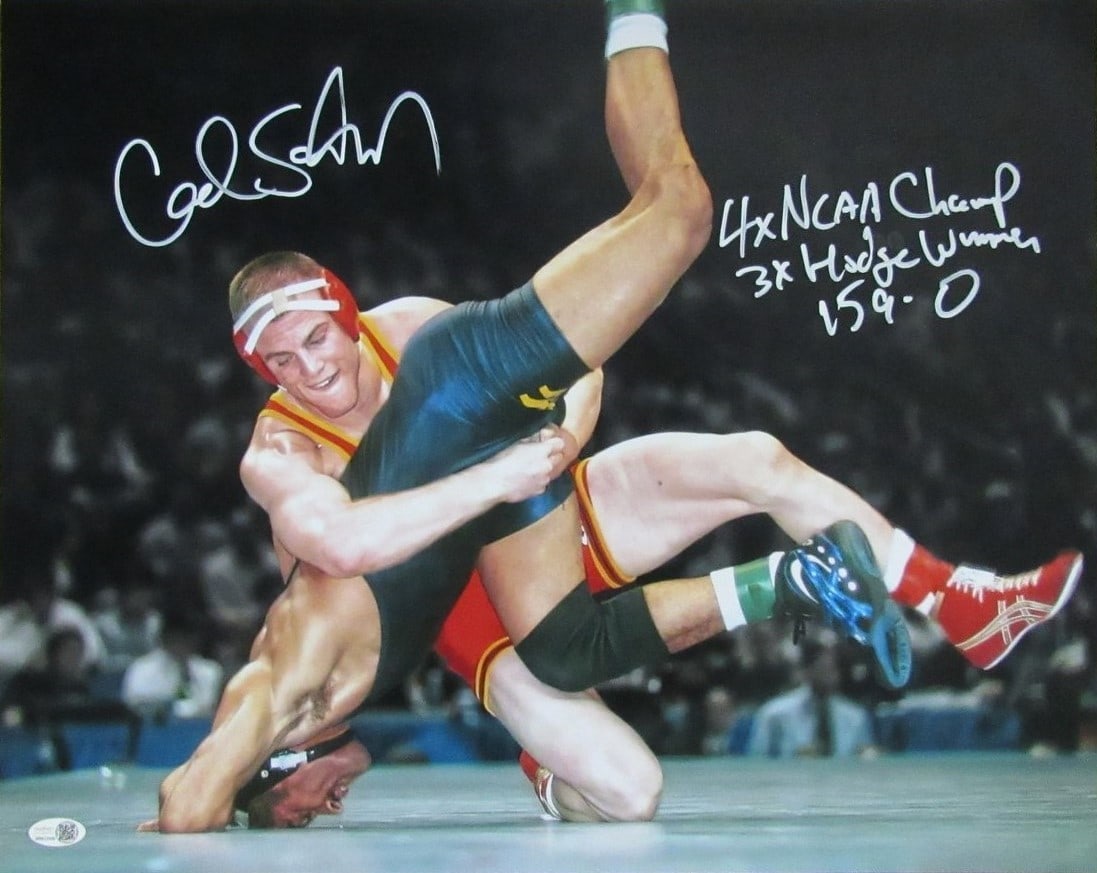 Cael Sanderson Autographed 16x20 Iowa State Wrestling Photo JSA Authenticated: Cael Sanderson Autographed 16x20 Iowa State Wrestling Photo JSA Authenticated This item features a signed and inscribed 16x20 photo of Cael Sanderson, showcasing his remarkable legacy in Iowa State Wr
