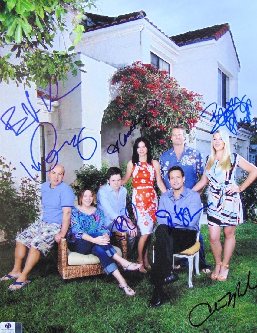 Cougar Town Cast Autographed 11x14 Photo by Courteney Cox and More: Cougar Town Cast Autographed 11x14 Photo by Courteney Cox and More This original 11x14 photograph features the cast of the beloved TV series 'Cougar Town', including signatures from Courteney Cox, Bus