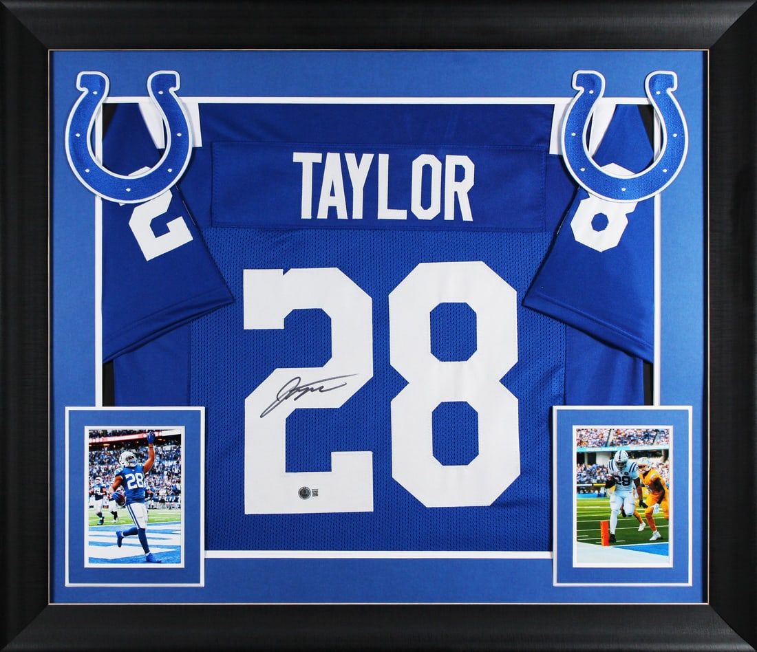 Framed Blue Jersey Signed by Jonathan Taylor with Beckett Authentication: Framed Blue Jersey Signed by Jonathan Taylor with Beckett Authentication This is an original blue pro style framed jersey autographed by Jonathan Taylor of the Indianapolis Colts. The signature has be