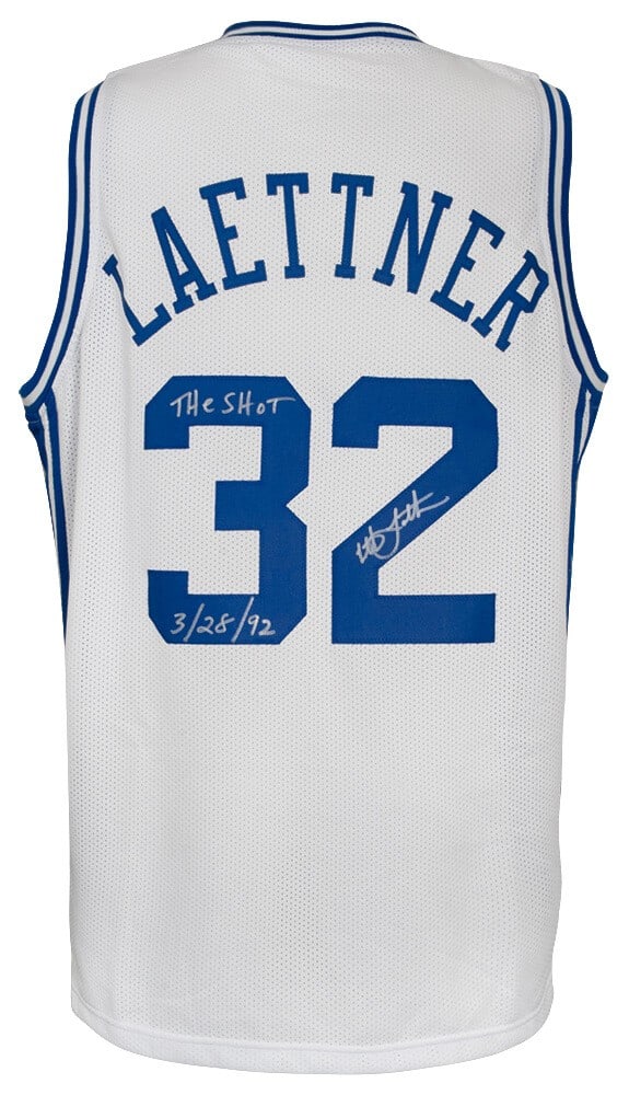 Christian Laettner Signed Duke Basketball Jersey with Inscription: Christian Laettner Signed Duke Basketball Jersey with Inscription This is a Christian Laettner signed white custom college basketball jersey featuring the inscription 'The Shot 3-28-92'. The jersey is