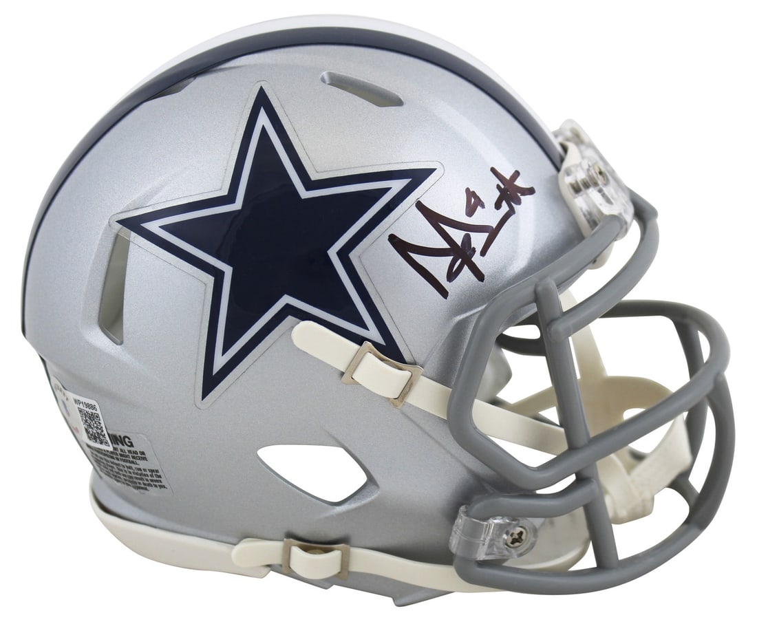Dak Prescott Signed Silver Speed Mini Helmet with BAS Hologram: Dak Prescott Signed Silver Speed Mini Helmet with BAS Hologram This authentic Silver Speed Mini Helmet has been personally signed by Dak Prescott, the star quarterback of the Dallas Cowboys. It featur