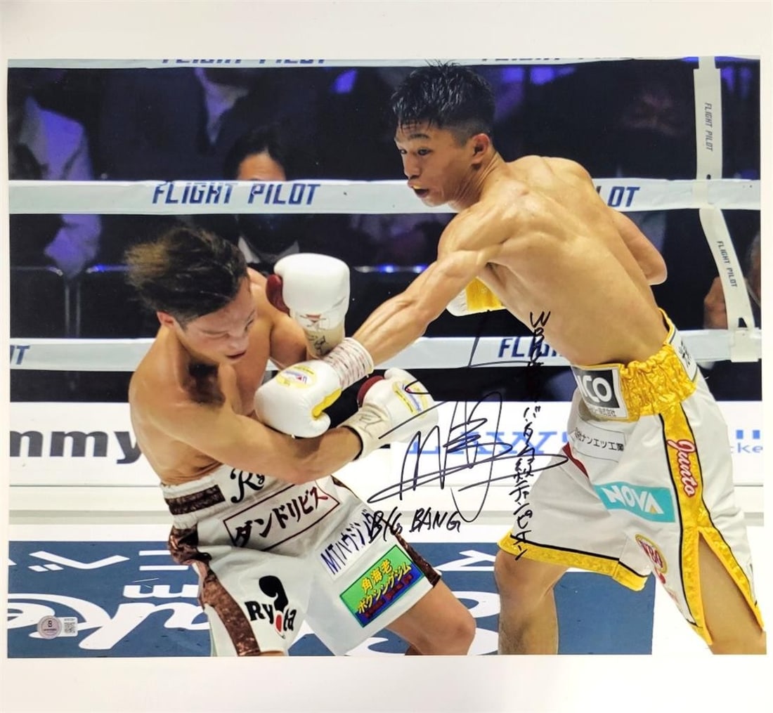 Junto Nakatani Signed Kanji Big Bang Photo 16x20 Beckett BAS: Junto Nakatani Signed Kanji Big Bang Photo 16x20 Beckett BAS This is a signed 16x20 photo featuring Manny Pacquiao, authenticated by Beckett Authentication Services (BAS). The photograph captures Pacq
