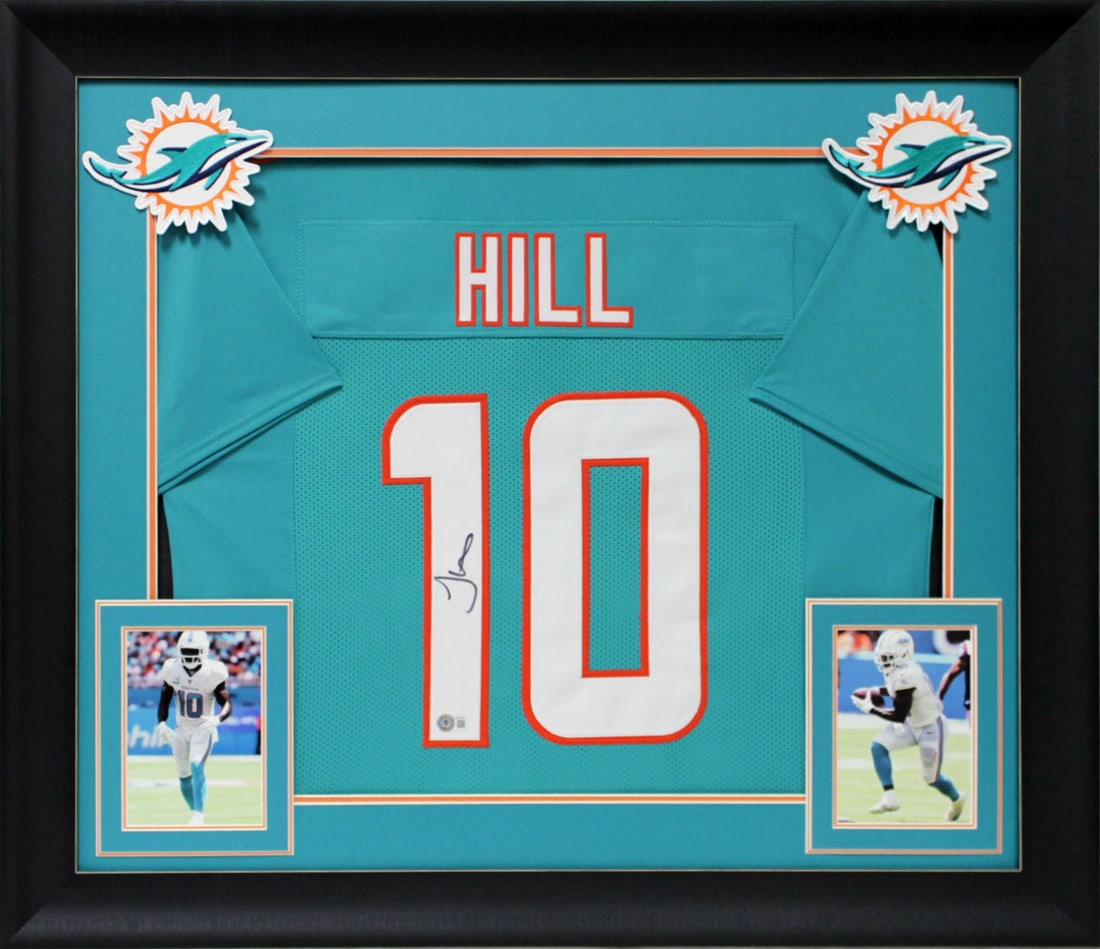 Tyreek Hill Signed Miami Dolphins Teal Framed Jersey BAS Witnessed: Tyreek Hill Signed Miami Dolphins Teal Framed Jersey BAS Witnessed This authentic teal pro style framed jersey is personally signed by Tyreek Hill of the Miami Dolphins. It features a unique autograph