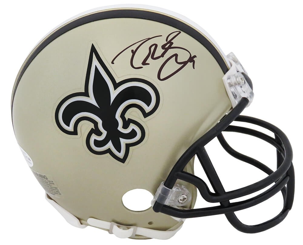 Saints Mini Helmet Autographed by Drew Brees with Beckett COA: Saints Mini Helmet Autographed by Drew Brees with Beckett COA This pre-owned Riddell mini helmet features the autograph of Drew Brees and represents the New Orleans Saints. The helmet is an original c