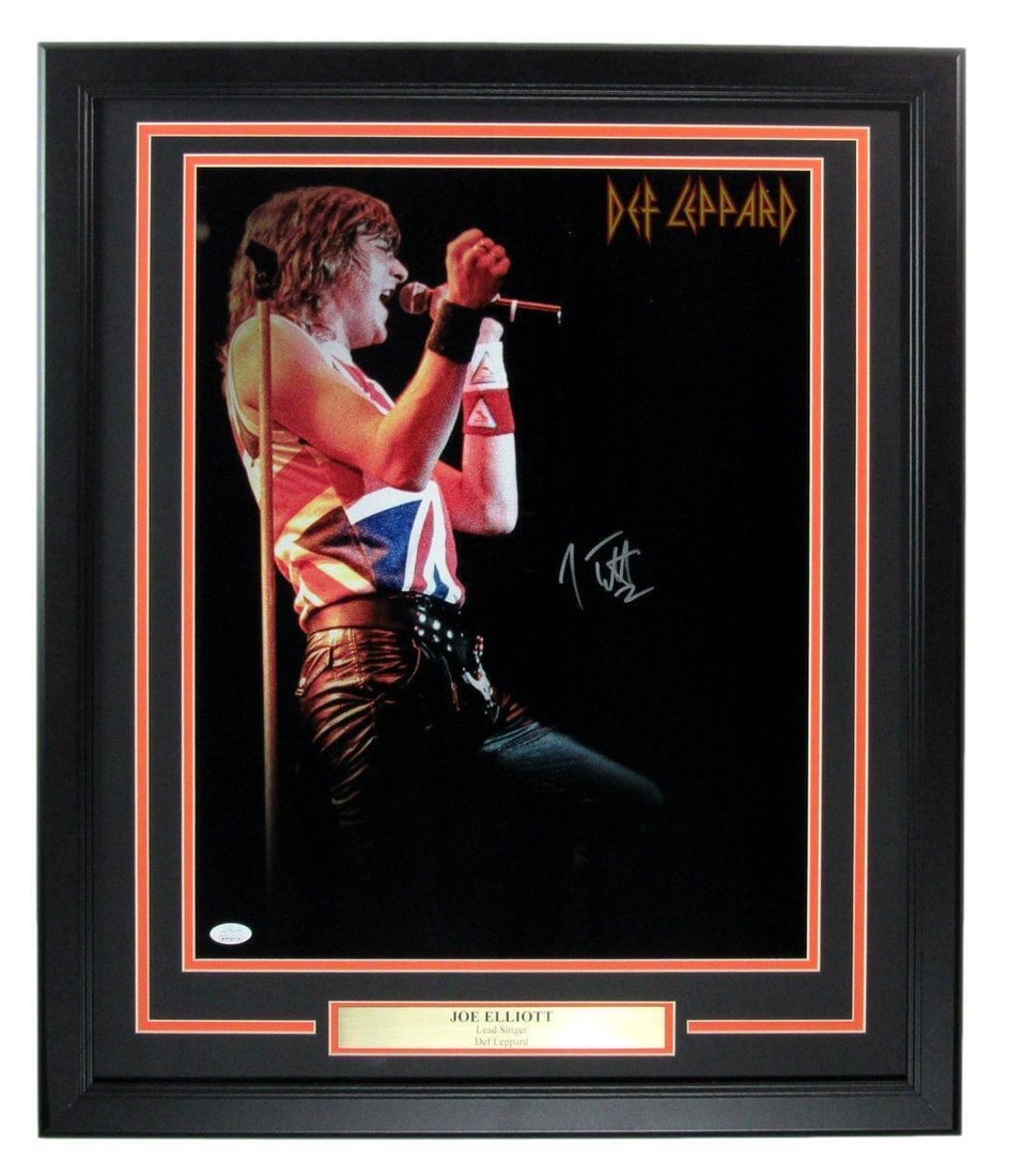 Joe Elliott Framed Autographed 16x20 Photo Def Leppard JSA Certified: Joe Elliott Framed Autographed 16x20 Photo Def Leppard JSA Certified This listing features a framed 16x20 photo of Joe Elliott, the iconic lead singer of Def Leppard, hand-signed by the artist himself