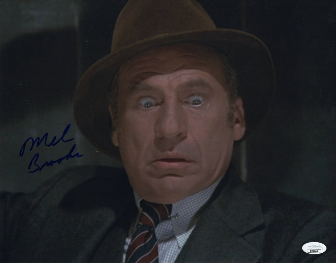 Mel Brooks Autographed 11x14 Photo High Anxiety JSA Certified: Mel Brooks Autographed 11x14 Photo High Anxiety JSA Certified This is an authentic 11" x 14" photograph of Mel Brooks, featuring his signature. The autograph has been verified by James Spence Authenti