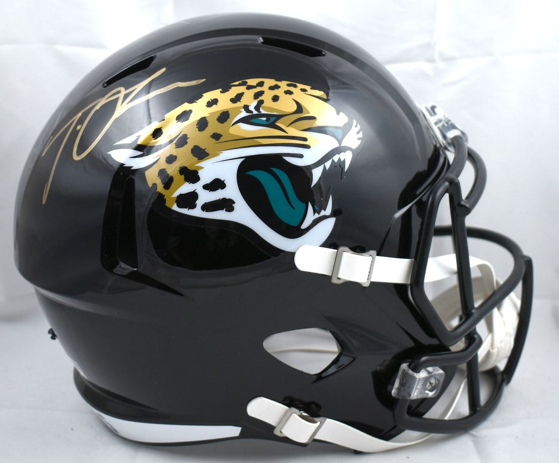 Trevor Lawrence Signed Jacksonville Jaguars Full Size Helmet Fanatics Authenticated: Trevor Lawrence Signed Jacksonville Jaguars Full Size Helmet Fanatics Authenticated This original full-size Speed helmet features the autograph of Trevor Lawrence, the talented quarterback of the Jack