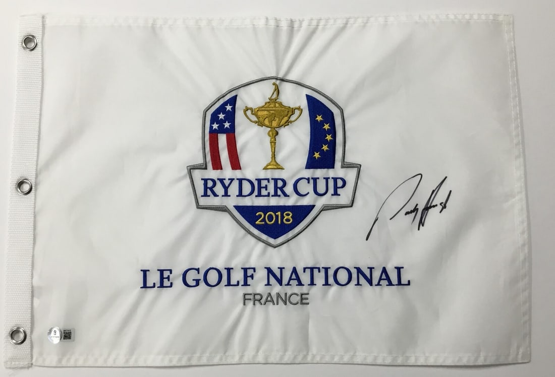 Padraig Harrington Signed 2018 Ryder Cup Flag Beckett Authenticated: Padraig Harrington Signed 2018 Ryder Cup Flag Beckett Authenticated This official 2018 France Ryder Cup pin flag is expertly signed by renowned PGA golfer Padraig Harrington. The signature has been au